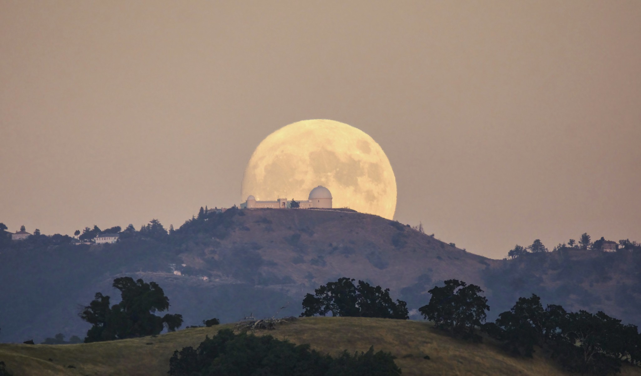 Super Blue Moon behind the big dome of the Lick Observatory